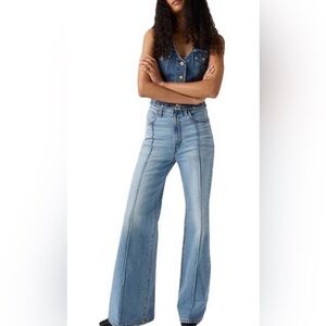 Levi's Women's Blue Ribcage Bell with frayed bottoms Western Jeans